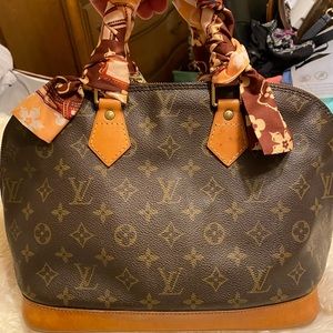 Sold authentic LV alma